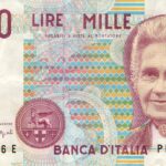 Moneta da 5 Lire con delfino, simbolo di valore collezionistico e storicità.