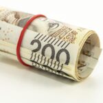 Immagine di buoni fruttiferi postali con grafico dei rendimenti e tipologie di investimento.