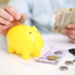 Conto corrente con grafico che mostra l'andamento dei risparmi e i nuovi controlli automatici.